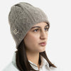 Плетена шапка с плетеници и метално лого - сивкаво бежова