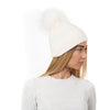 Топла зимна шапка с помпон - бяла